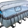 Grauer EXIT Stone Pool 540x250x122cm mit Abdeckung und Sandfilterpumpe.