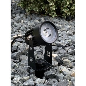 Schwarzer LED Solar Gartenstrahler Simon, 3er Set, auf Kies. Solar-Wegeleuchte für den Garten.