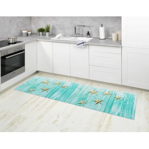 Mehrfarbige Wenko Badematte Mediaster (65x200 cm) mit Seestern-Motiv in Küche.