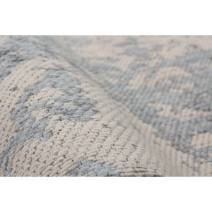 Detailansicht des grauen Vintageteppichs Miamar 395, 120x170 cm, mit weicher Haptik und Baumwollrücken.