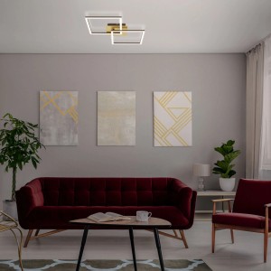 Moderne, dimmbare LED-Deckenleuchte Frame in Braun-Gold von Brilo im Wohnraum.