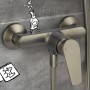 Moderne baliv Duscharmatur DU-5900 Gunmetal. Einhebelmischer an grauer Wand, mit Brauseschlauchanschluss.