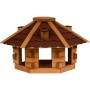 Sechseckiges Vogelhaus aus hellem Kiefernholz im Blockhaus-Stil mit rotem Bitumendach. Robustes Futterhaus.