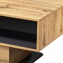 Couchtisch mit natürlicher Holzmaserung und schwarzem Staufach. Moderner Wohnzimmertisch aus Spanplatte in Eichenoptik.