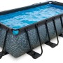 Rechteckiger grauer EXIT Stone Pool 400x200x100cm mit Abdeckung, Sandfilterpumpe und Wärmepumpe.