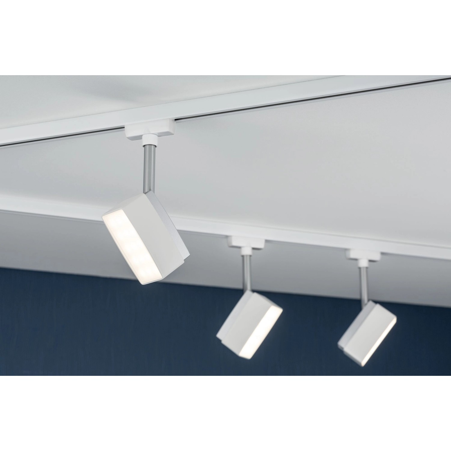 Paulmann URail LED-Spot Pedal, 5W, weiß, an einem Schienensystem montiert.