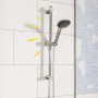 Grohe QuickFix Brausestangenset Vitalio Joy 110 Mono Chrom an weißer Wand.