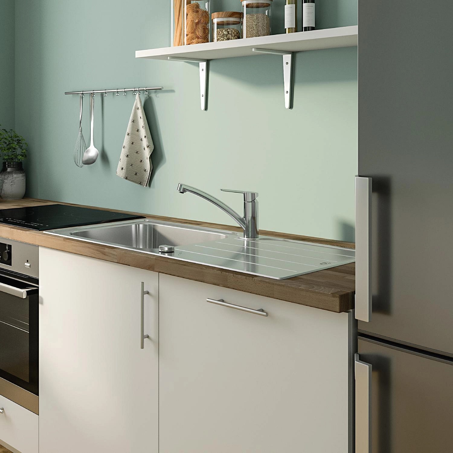 Grohe QuickFix Spültischarmatur in Chrom, schwenkbarer Auslauf für Spültische.