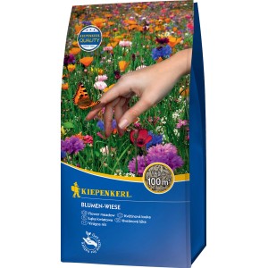 Kiepenkerl Blumen-Wiese 1kg: Packung mit blühender Wiese und Schmetterling auf Hand.
