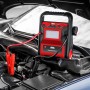 APA Starthilfe Powerpack 300 A mit Kompressor im Motorraum, rote Klemmen an Batterie.