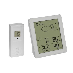 Weiße TFA Funk-Wetterstation Clear mit Außensender zeigt Temperatur, Luftfeuchtigkeit und Wettervorhersage.