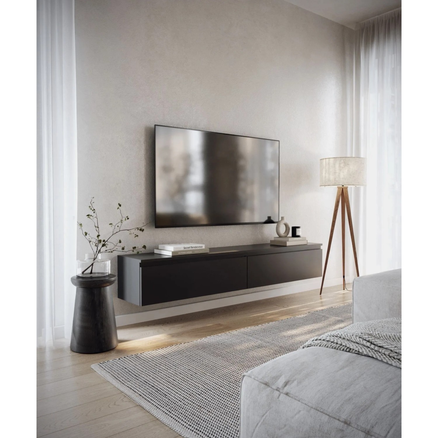 Schwarzes Selsey TV-Hängeboard Bemmi 175 cm, schwebend unter TV in modernem Wohnzimmer. Zwei Klappfächer, matte Oberfläche.