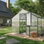 KGT Gewächshaus Nelke III in Anthrazit-Grau (2,97x3,23m) mit geöffneter Tür im Garten.