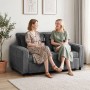 Dunkelgraues HOMCOM Schlafsofa aus Cordstoff mit zwei Personen im Wohnzimmer.
