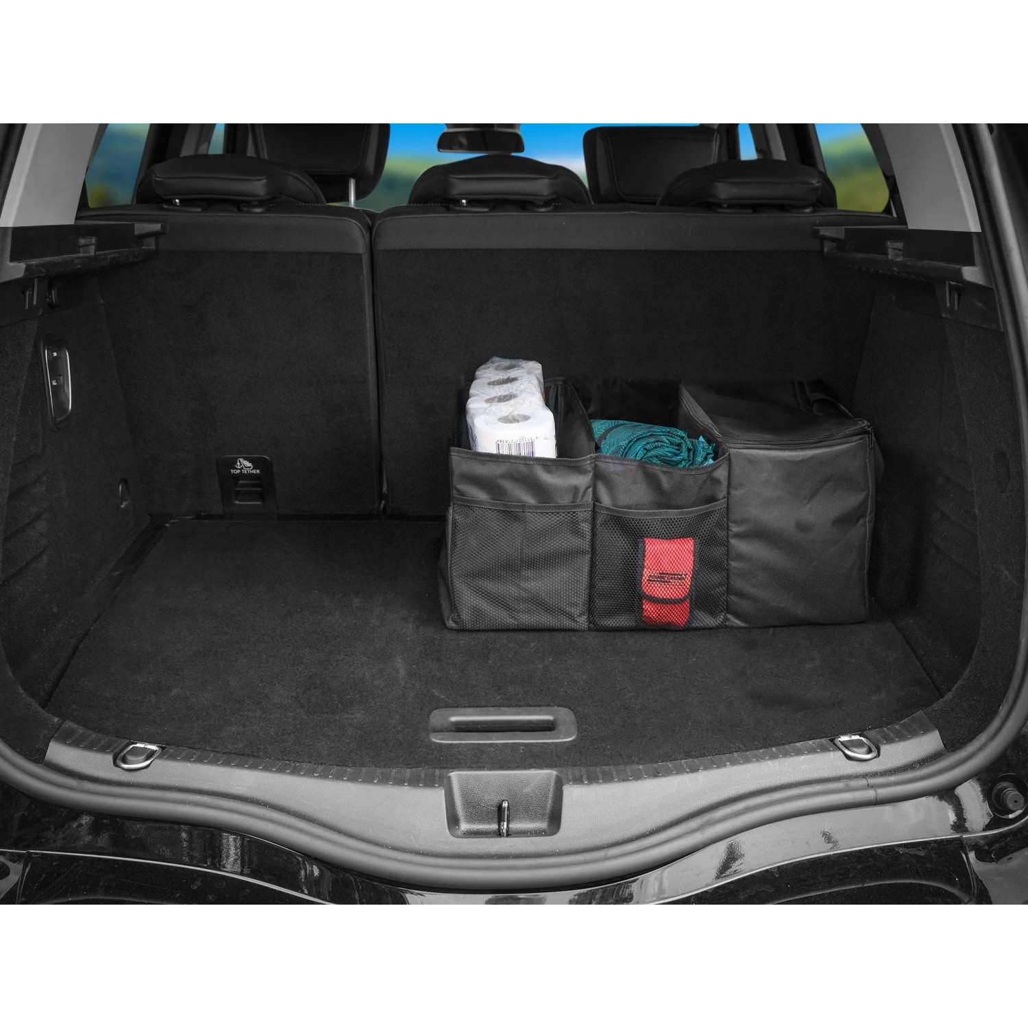 Schwarze Apa Faltbare Kofferraumtasche mit Kühlfach im Auto.