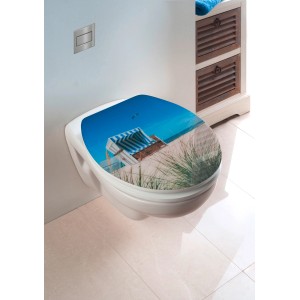 Wenko WC-Sitz Strandkorb mit Strandmotiv auf weißer Toilette im Badezimmer.