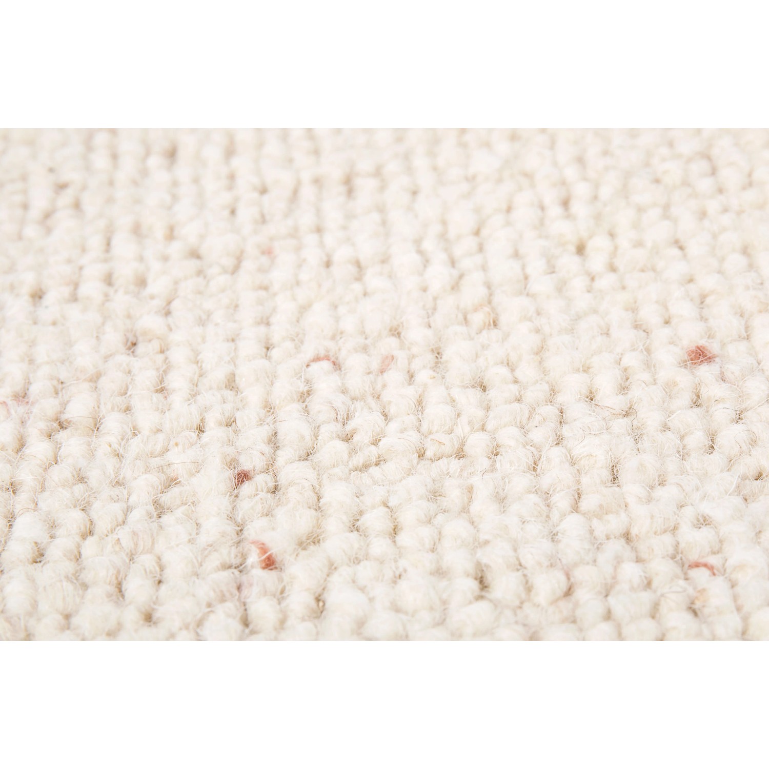 Detailaufnahme: Andiamo Stufenmatte Volterra Creme, Schurwolle, 2er Set.