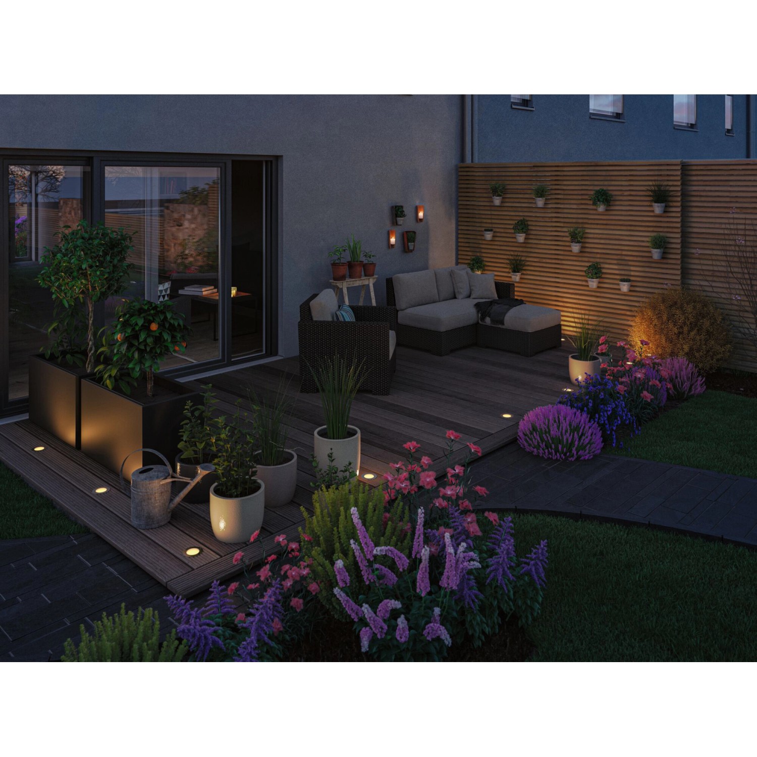 Paulmann LED-Bodeneinbaustrahler Plug & Shine im Garten, warmweißes Licht.