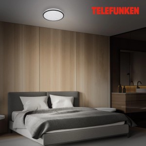 Telefunken LED-Deckenleuchte Tepi, Ø 28 cm, schwarz, mit Sternendekor und Sensor im Schlafzimmer.