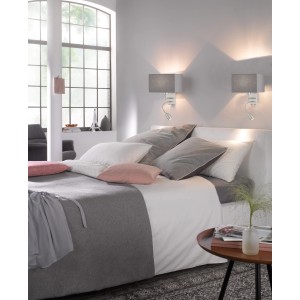 Zwei Fischer & Honsel Wandleuchten Dream in Grau/Nickel über einem Bett.