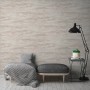 A.S. Création Vliestapete Putzoptik in Weiß und Beige an Wohnzimmerwand.