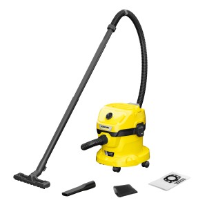 Kärcher Akku Nass-Trockensauger WD 2-18 mit Zubehör wie Düsen und Filterbeutel.