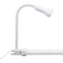Weiße Schreibtischleuchte Füssen mit flexiblem Arm und Klemme zur Befestigung.