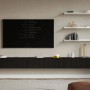 Schwarzes Selsey TV-Hängeboard Veldio 300 cm mit geriffelter Lamellenfront in modernem Wohnzimmer. Bietet Stauraum.