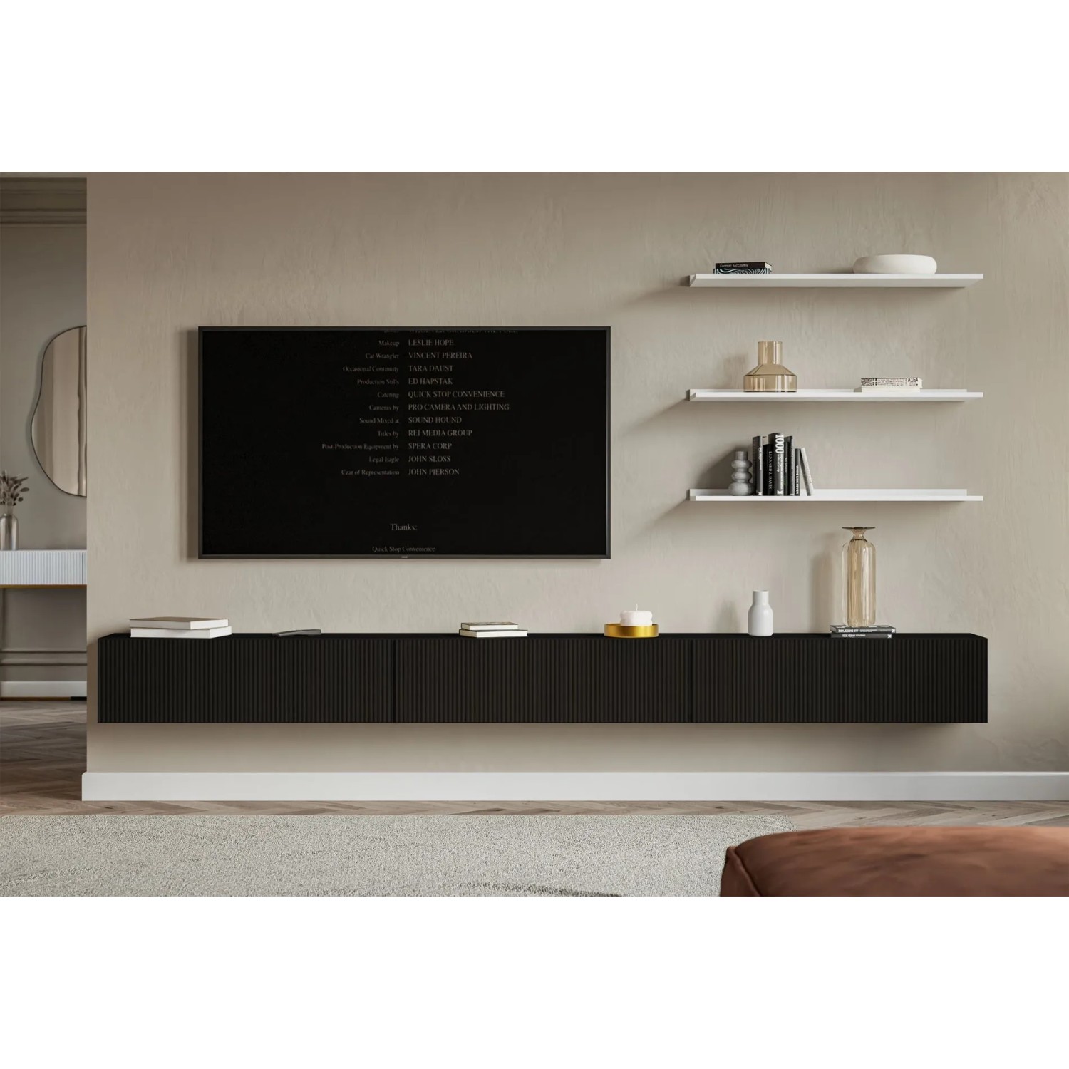 Schwarzes Selsey TV-Hängeboard Veldio 300 cm mit geriffelter Lamellenfront in modernem Wohnzimmer. Bietet Stauraum.