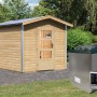 Karibu Saunahaus Espen 1 mit Ofen und externer Steuerung im Garten.