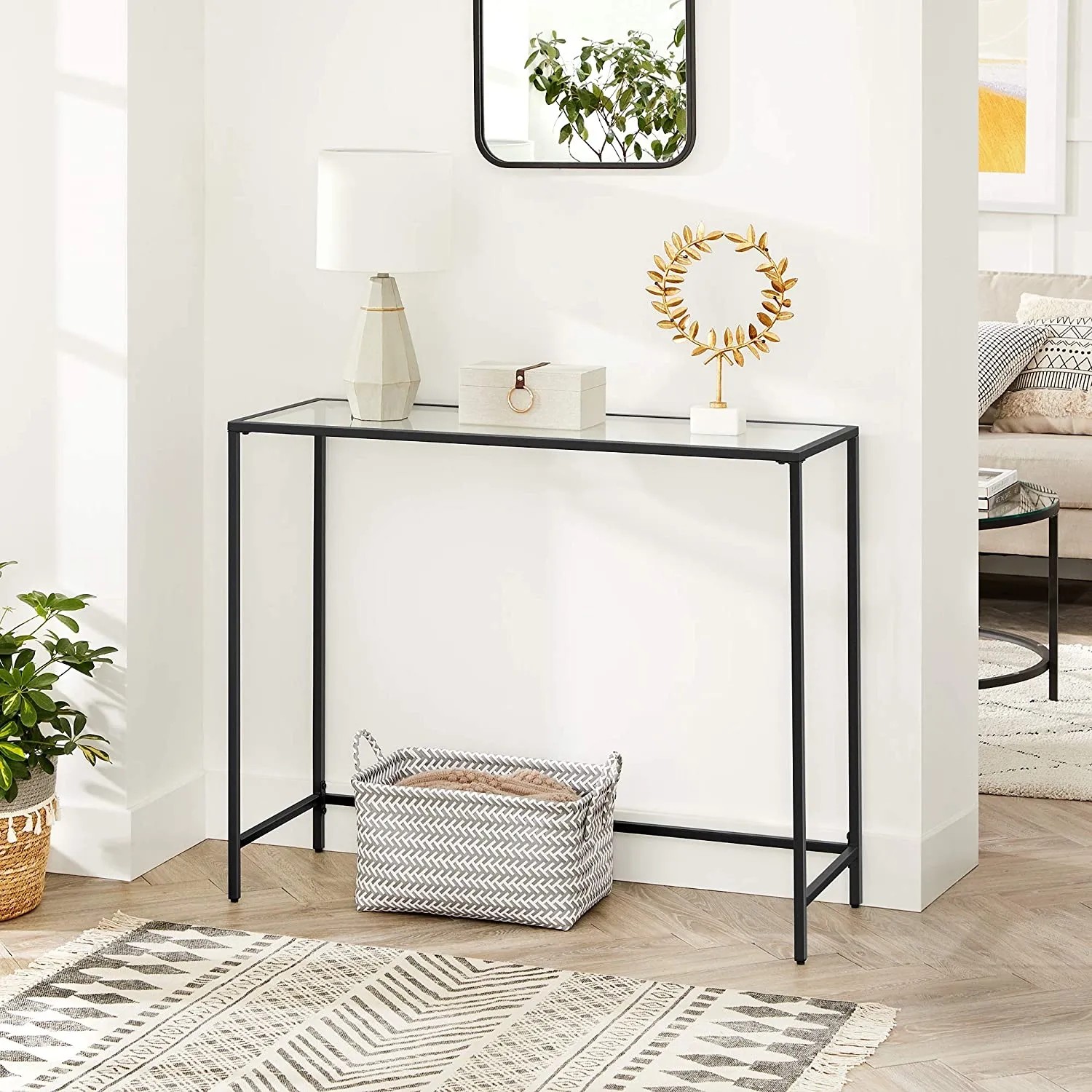 Vasagle Konsolentisch mit schwarzem Metallgestell und transparenter Glasplatte. Modernes Design.