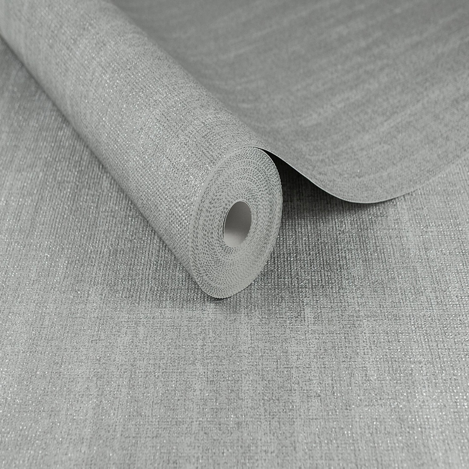 Rolle Boutique Vliestapete Chenille Silver mit leichter Struktur und Glimmer-Effekt.