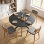 Runder schwarzer Esstisch mit rustikaler Holzoptik-Platte und stabilen Stahl-X-Beinen, für 4 Personen. Modernes Esszimmer-Design.
