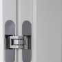 Detailaufnahme: Flächenbündige, weiße Türzarge mit verdecktem Türband.