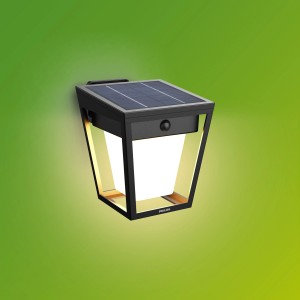 Schwarze Philips Nissa Solar Wandleuchte mit Solarpanel und Bewegungssensor.