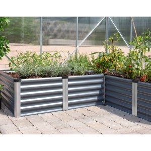 Eckiges, graues Vitavia Innenbeet Linus 401 aus Metall mit Pflanzen befüllt.