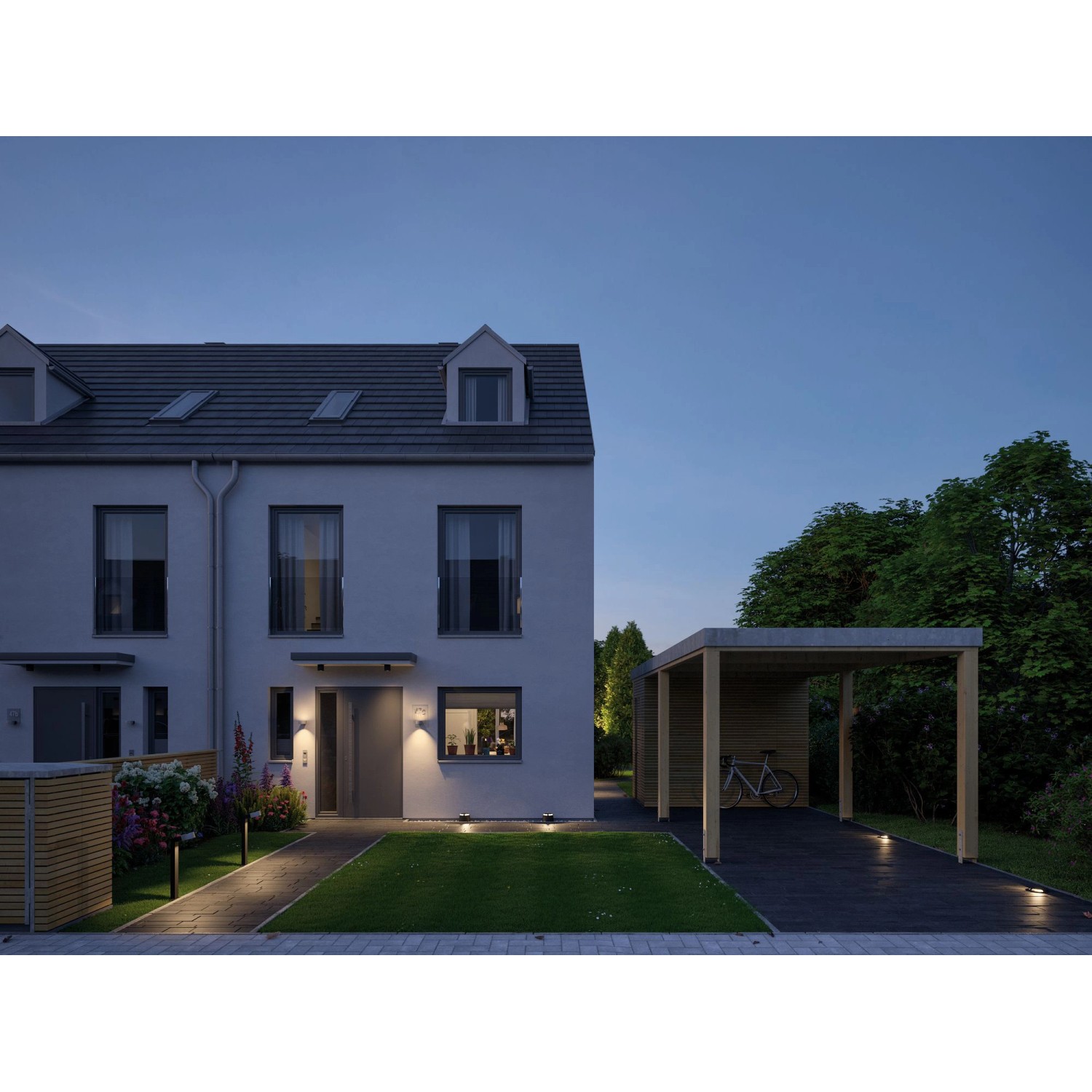 Beleuchtetes Haus mit Paulmann Plug & Shine Bodenleuchten, warmweißes Licht.