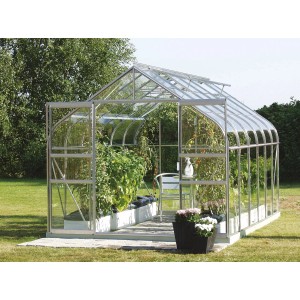 Vitavia Gewächshaus Diana 9900 mit Alu-Rahmen, Glas und Pflanzen im Garten.