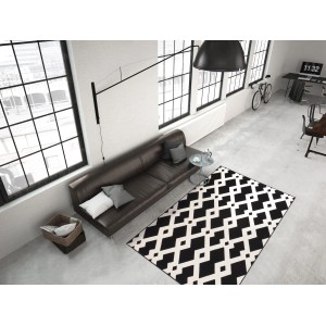 Moderner Teppich Icon 310, schwarz-weiß, 120x170 cm, mit geometrischem Muster im Wohnraum.