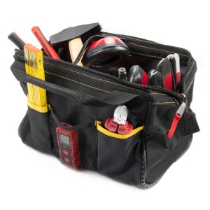 Cat Werkzeugtasche, 33 cm, schwarz-gelb, gefüllt mit Werkzeugen wie Hammer, Zollstock und Zange.