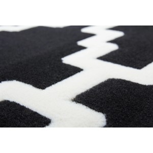 Detailansicht: Schwarzer Teppich mit elfenbeinfarbenem Retro-Muster, 80x300 cm.