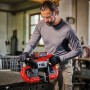 Einhell Akku-Bandsäge TE-MB 18/127 Li-Solo in Nutzung, rot/schwarz, für Metallarbeiten.