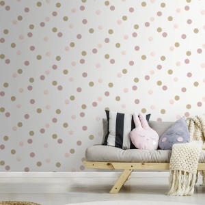 Vliestapete Superfresco Easy mit rosa-goldenen Punkten im Kinderzimmer.