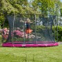 Pinkes Salta Comfort Edition Bodentrampolin (ø 213 cm) mit Sicherheitsnetz, Kind springt.