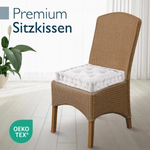Beautissu Mila Stuhlkissen 50x50 Natur auf einem Stuhl. Bequemes Sitzkissen für Garten und Wohnbereich.