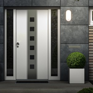 Weiße Briloner LED Wandleuchte mit Bewegungsmelder an einer Hauswand.