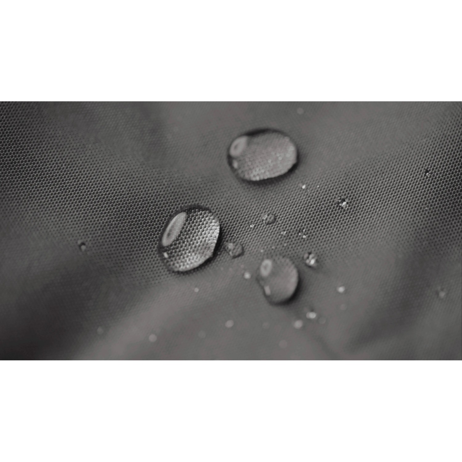 Detailaufnahme: Wasserabweisender Bezug des anthrazitfarbenen Sitting Point Hocker Scuba DotCom.