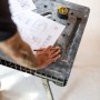 Stanley FatMax Werkbank klappbar mit Bauplan und Maßband auf Arbeitsfläche.