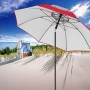 Roter Doppler Strandschirm Windprofi Neo 200 am Strand mit blau-weißem Strandkorb.