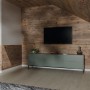 Wohnraum mit Egger Decowall Wandpaneelen in Fichte Natur und passender Abdeckleiste.